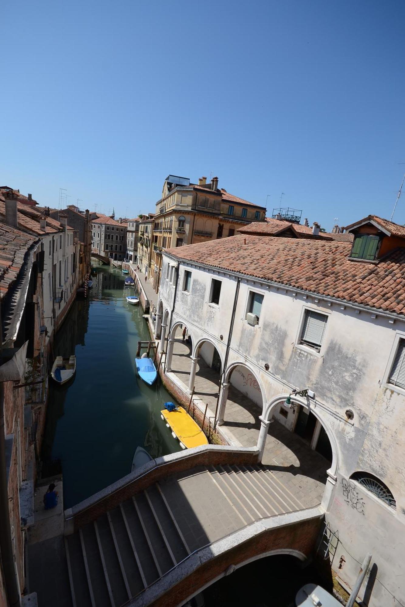 Three-Bedroom Apartment with Canal View